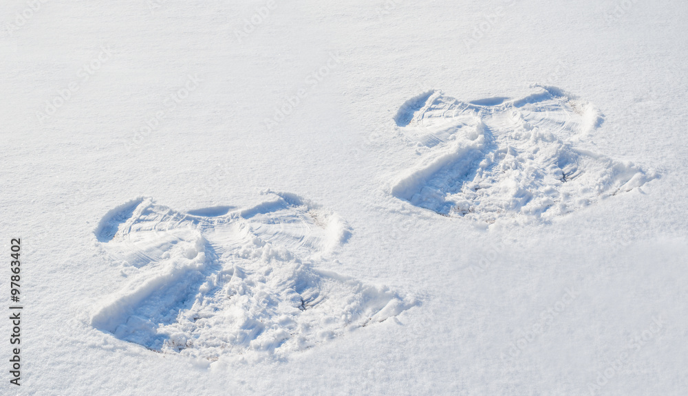 Two figures in the snow angel