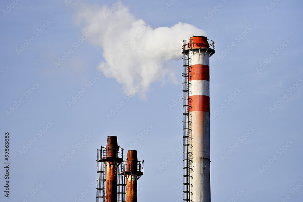 Steam coming out from an industrial chimney