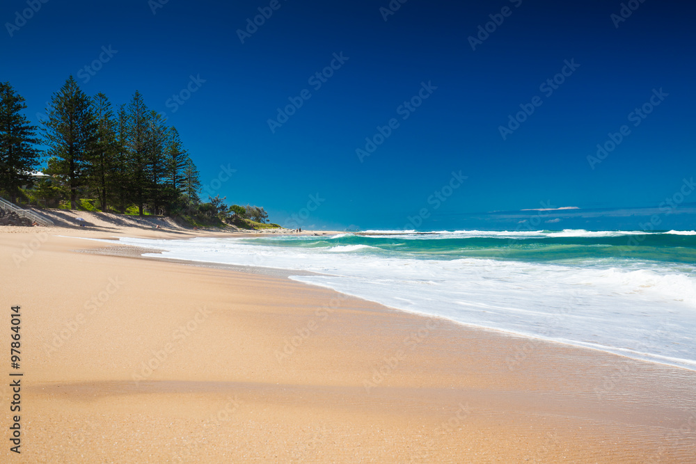 Deserted section of Dicky Beach on a sunny day, Caloundra, Austr
