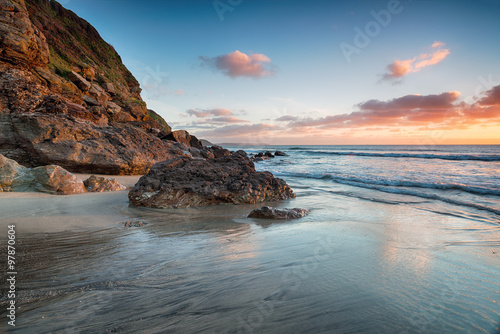 Beautiful sunrise on the beach at Pentewan near St Austell in Cornwall