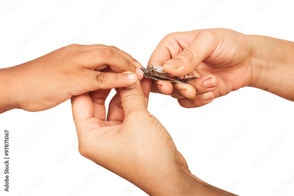 Mother cutting Fingernails for her son