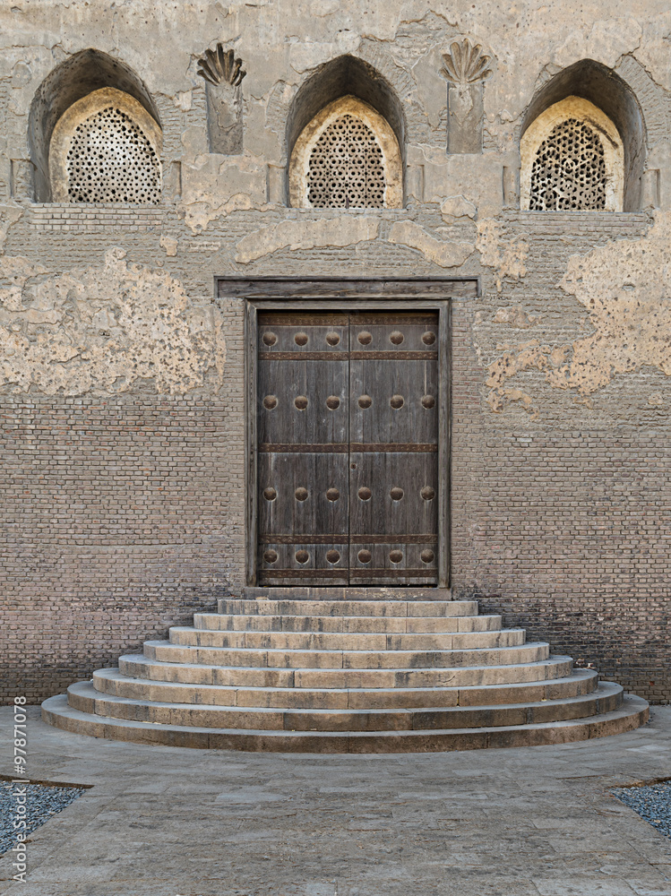 Fototapeta premium One of the doors of the front courtyard of Ibn Tulun Mosque, the largest mosque in Cairo, Egypt. and may be the oldest mosque in the city with its original form