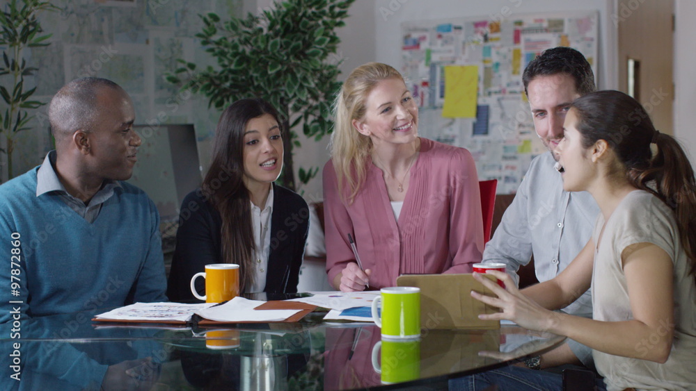 Portrait of smiling casual business team in a meeting Portrait of smiling casual business team in a meeting