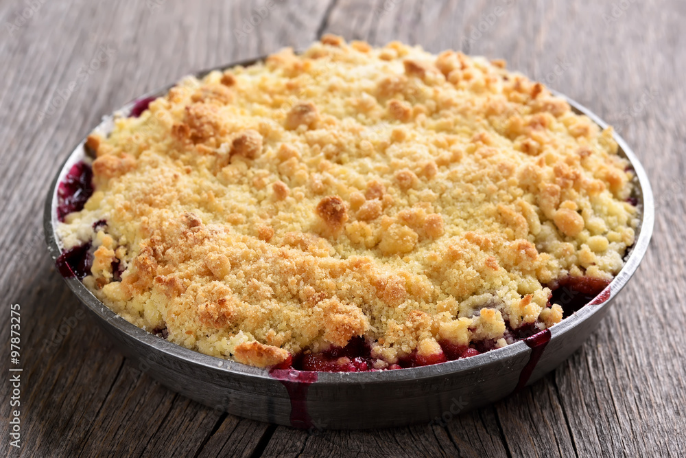 Plums crumble pie, close up view Plums crumble pie, close up view