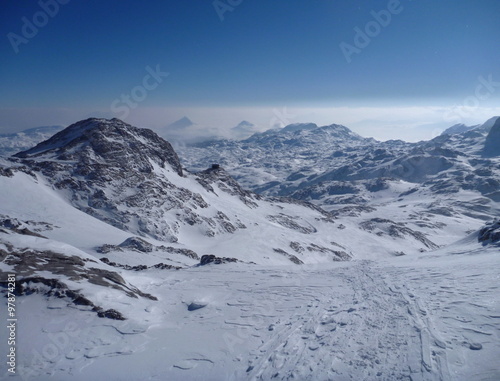 panoramatic view of snow covered high mountains © luciezr