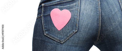 Fotografija Girl bum with paper heart on her jeans pocket letterbox
