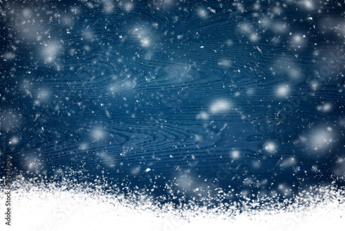 Winter background with flying snowflakes