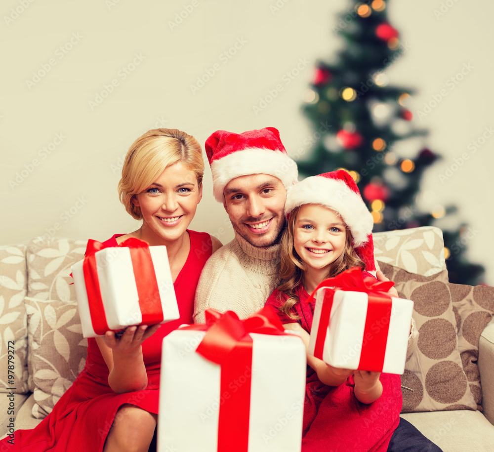 smiling family giving many gift boxes smiling family giving many gift boxes