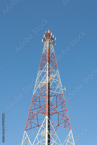 Communications tower with a blue sky