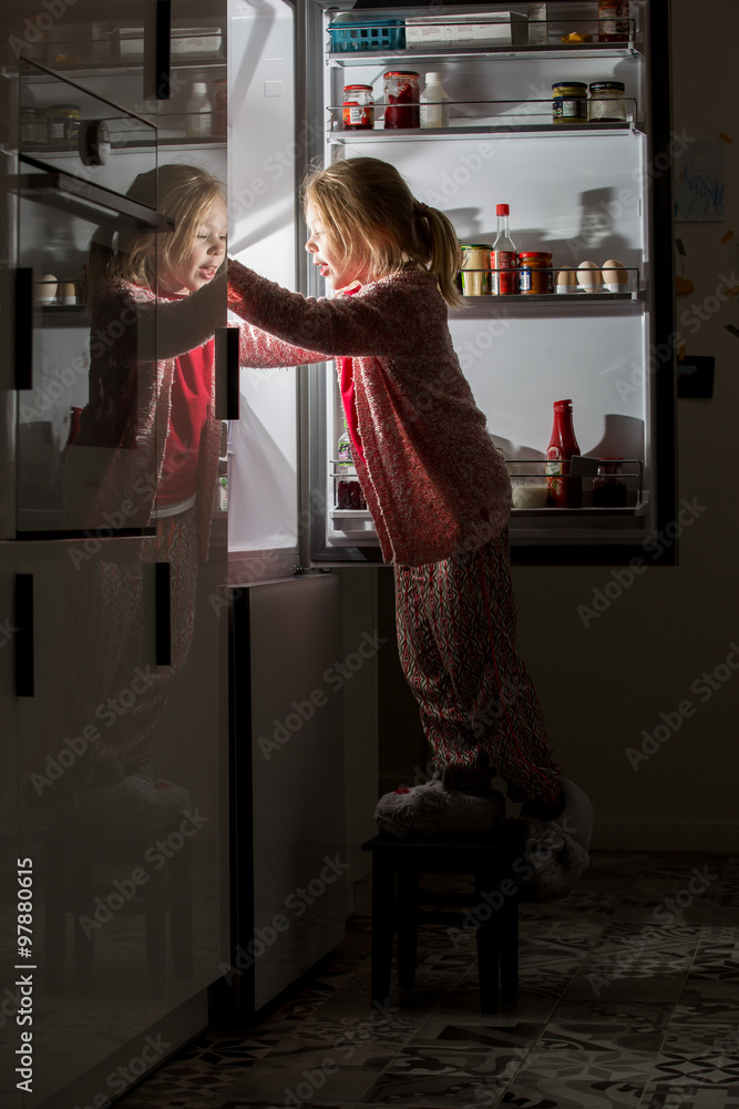 looking into fridge