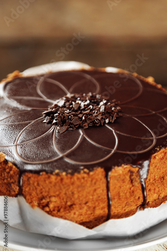 Wallpaper Mural Tasty chocolate cake on wooden background Torontodigital.ca