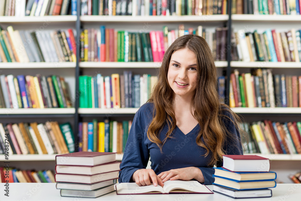 girl reding books in the library, studying girl reding books in the library, studying