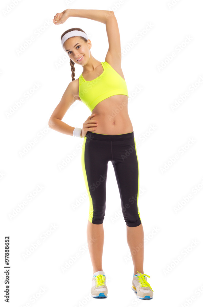Sporty girl doing gymnastic exercises Sporty girl doing gymnastic exercises