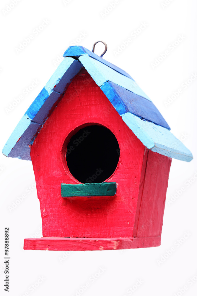 colorful bird house isolated on white background.