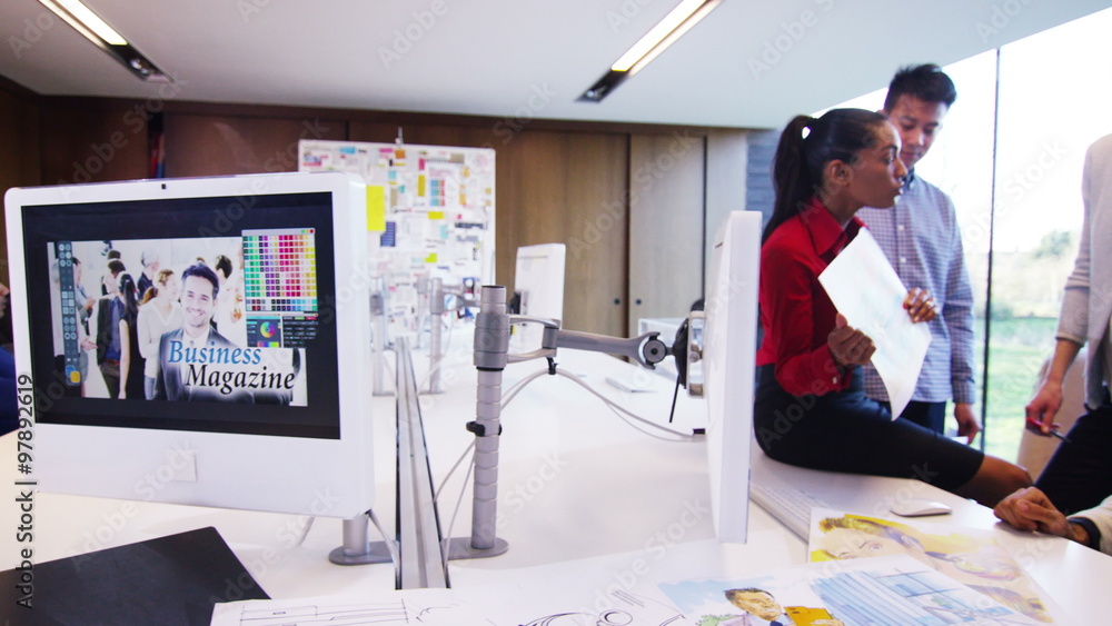 Team of Designers working together in modern office Team of Designers working together in modern office
