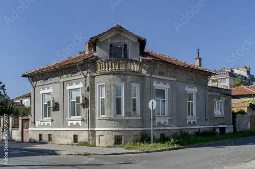 Razgrad town, street and house. Old corner house with balcony, Bulgaria 