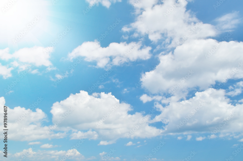 White clouds and blue sky with sun light. White clouds and blue sky with sun light.