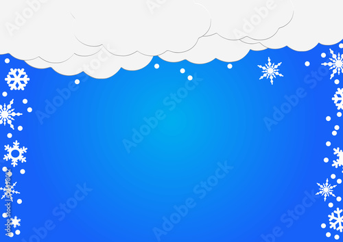 An abstract vector background of white paper clouds with snowfla photo