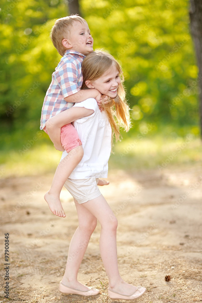 Portrait of a boy and girl in summer Portrait of a boy and girl in summer