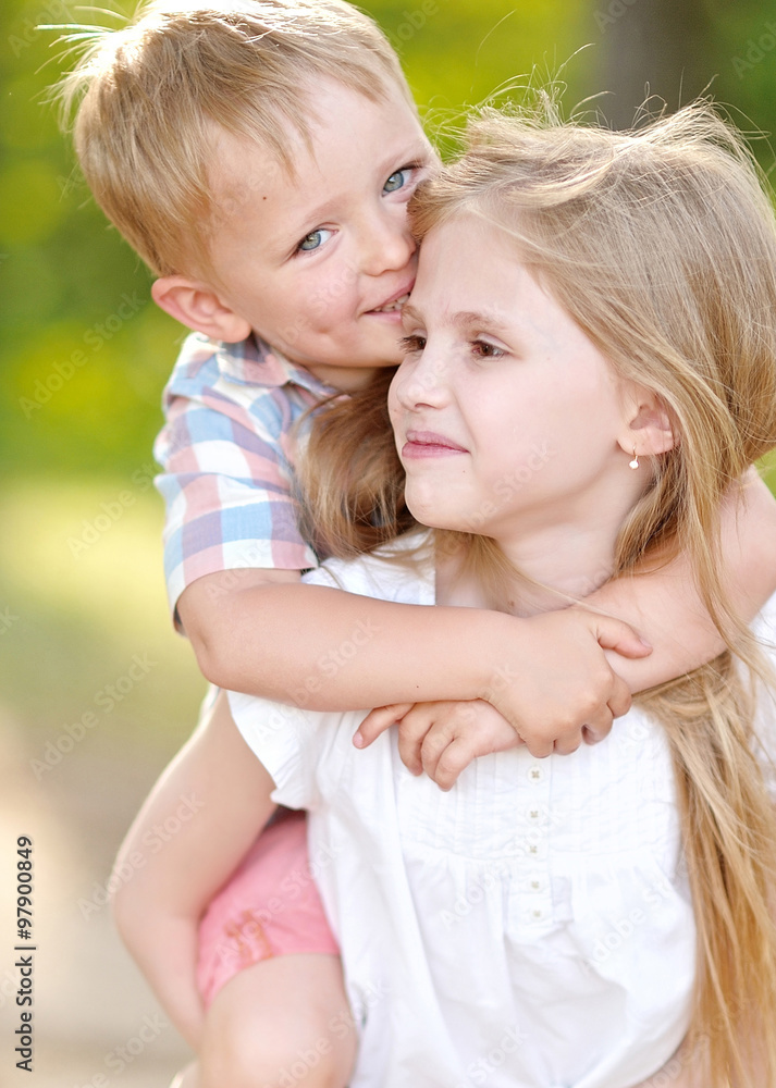 Portrait of a boy and girl in summer Portrait of a boy and girl in summer
