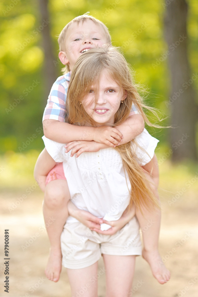 Portrait of a boy and girl in summer Portrait of a boy and girl in summer