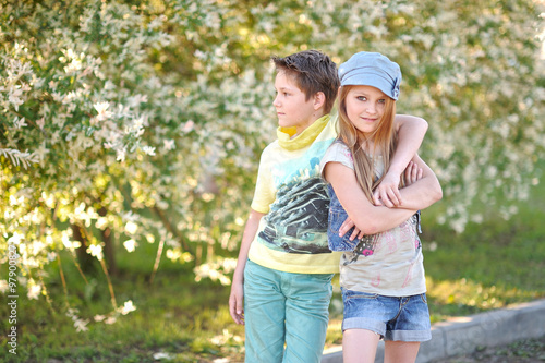 Portrait of a boy and girl in summer