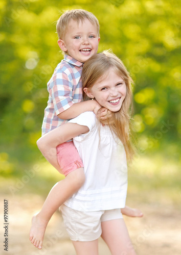 Portrait of a boy and girl in summer