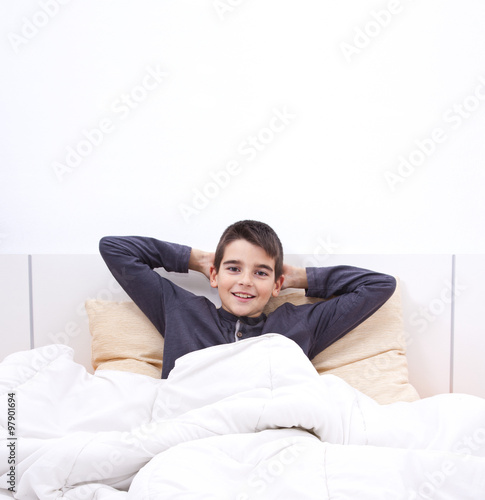 child lying in bed