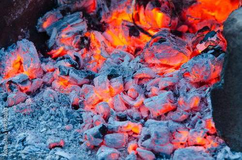 Glowing embers campfire closeup