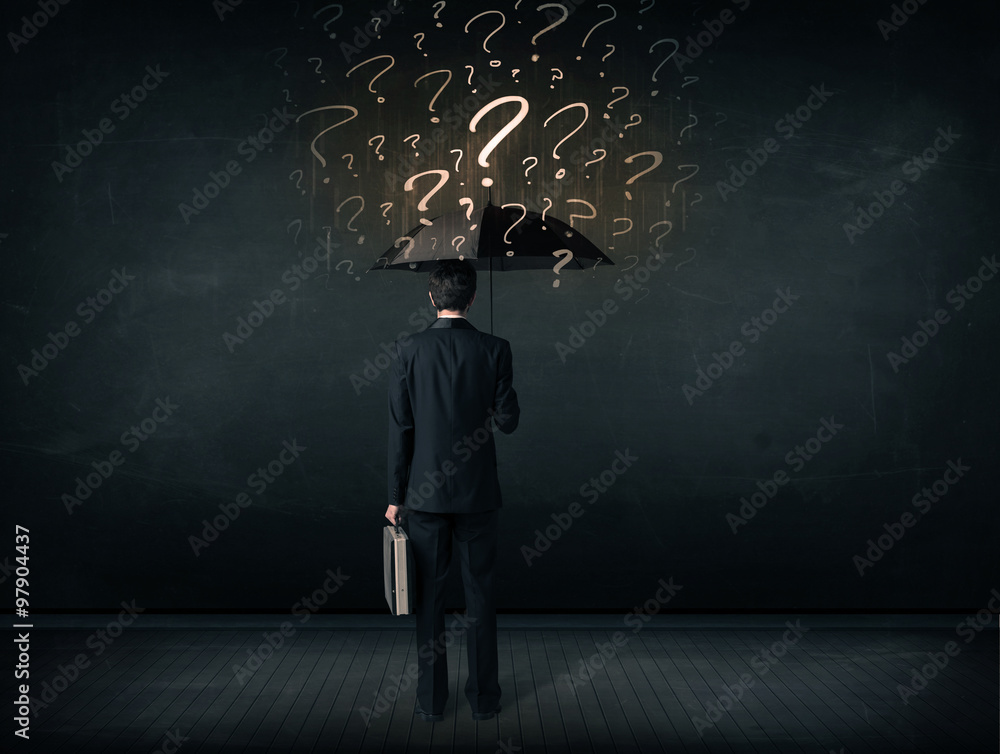 Businessman with umbrella and a lot of drawn question marks Businessman with umbrella and a lot of drawn question marks
