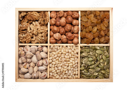 Nuts, seeds and raisins in a wooden box