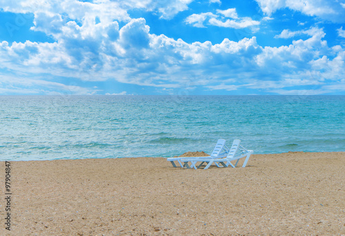 Tableau sur toile Two sunbed on the beach in Crimea