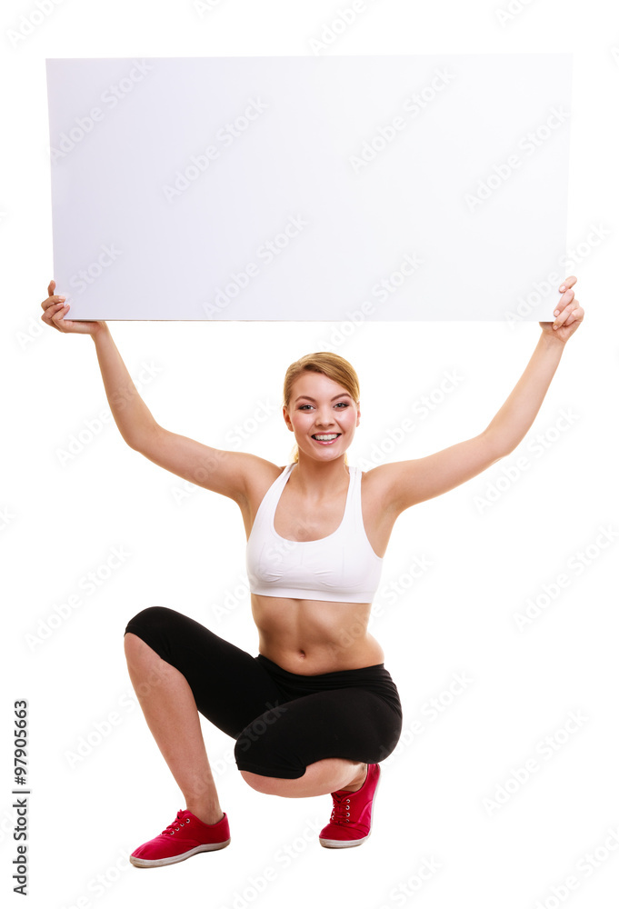 Fitness sporty woman holding blank empty ad banner Fitness sporty woman holding blank empty ad banner