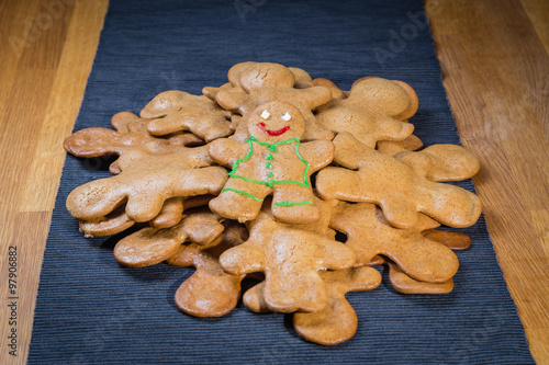 Christmas homemade gingerbread man on table