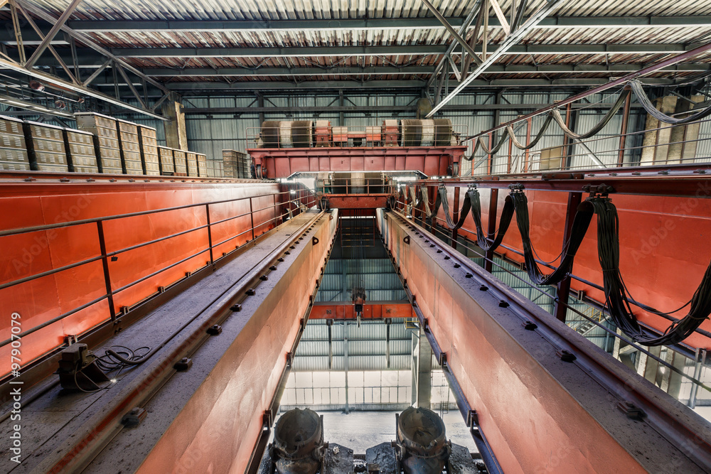 Large industrial crane equipment scene in steel mill Stock Photo