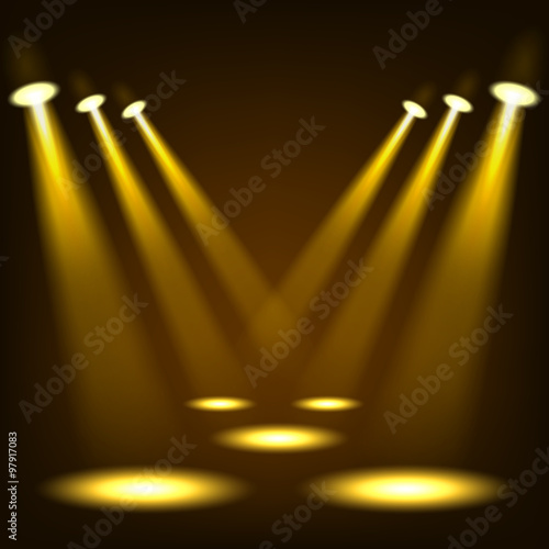 Gold spotlights shining in dark place background