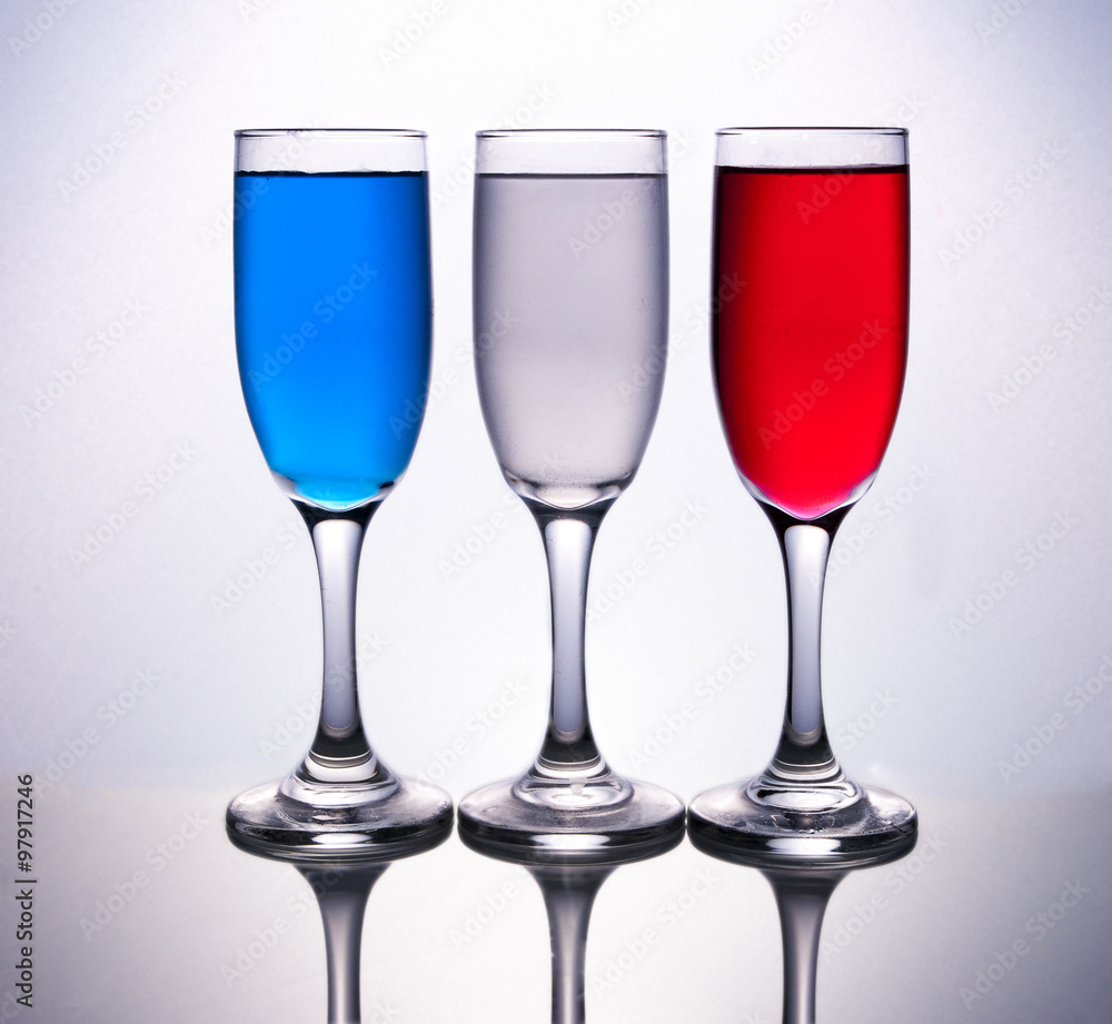 3 cups filled with french colours 3 cups filled with french colours