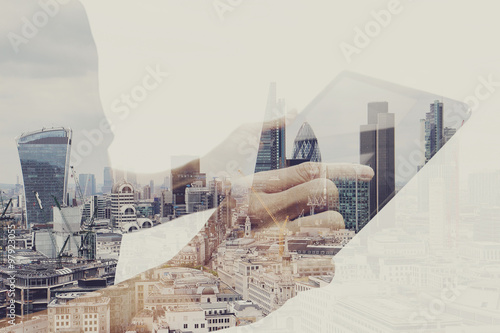 Foto Double exposure of success businessman using digital tablet with