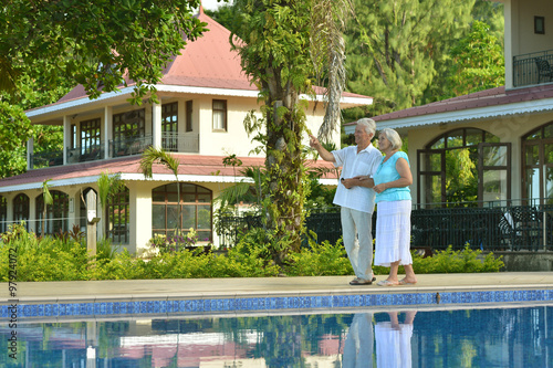 Senior couple near pool