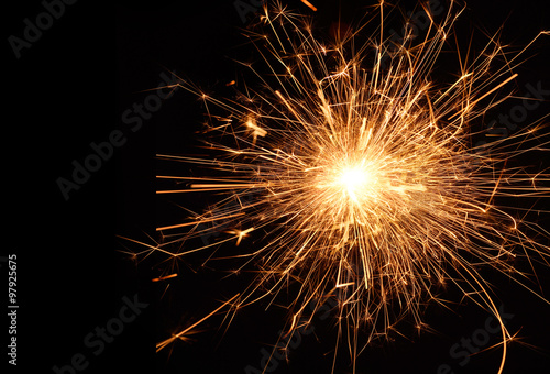 Christmas and new year party sparkler on black