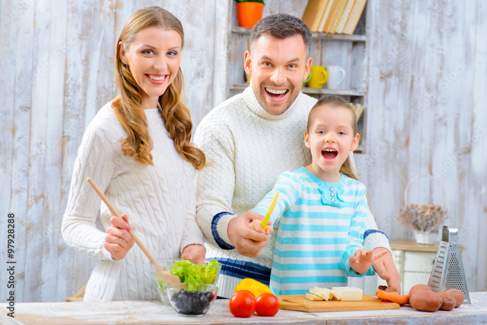 Happy family cooking together 