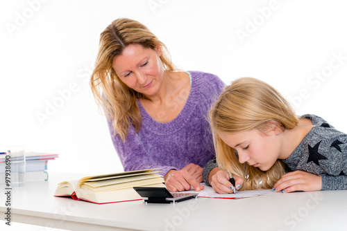 girl and together with teacher in the classroom