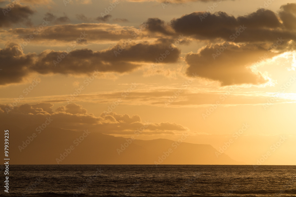 Sunset over the ocean colored sky in sepia. Sunset over the ocean colored sky in sepia.