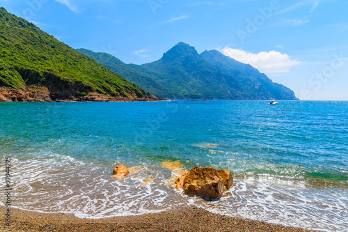 Fototapeta Naklejka Na Ścianę i Meble -  Beautiful secluded beach with azure sea water near Girolata bay, Corsica island, France