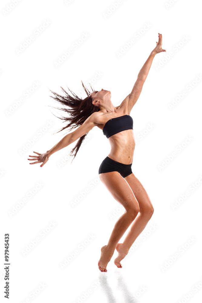 Stylish and young modern style dancer jumping Stylish and young modern style dancer jumping