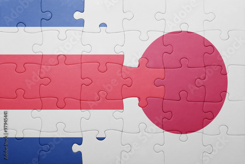 puzzle with the national flag of costa rica and japan