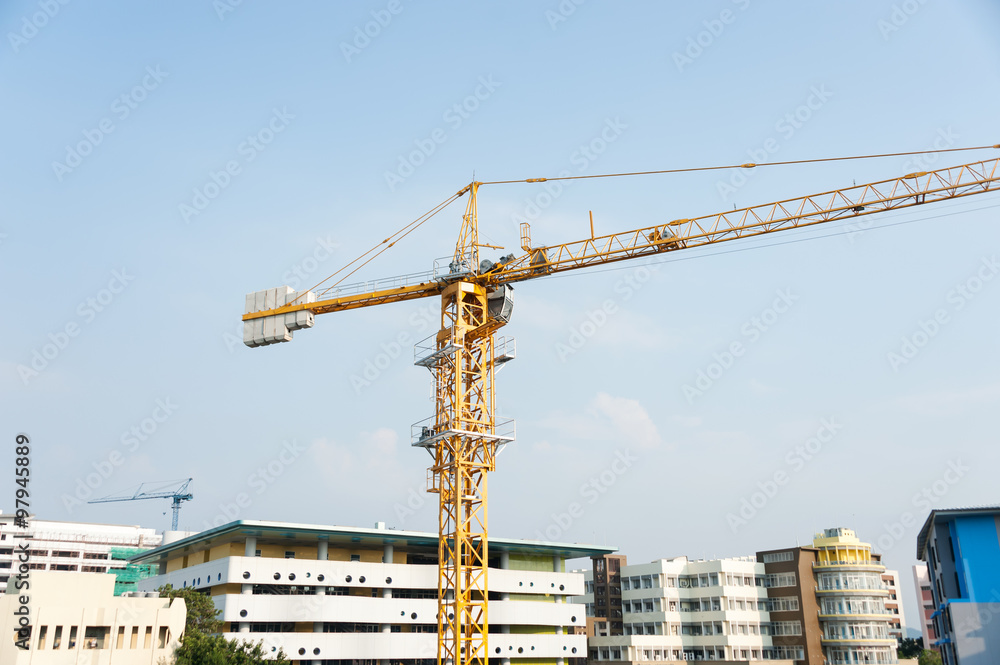 Crane in construction with blue sky