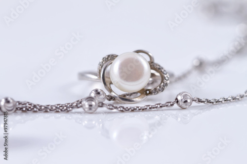 Unusual beautiful silver chain and a silver ring with pearl