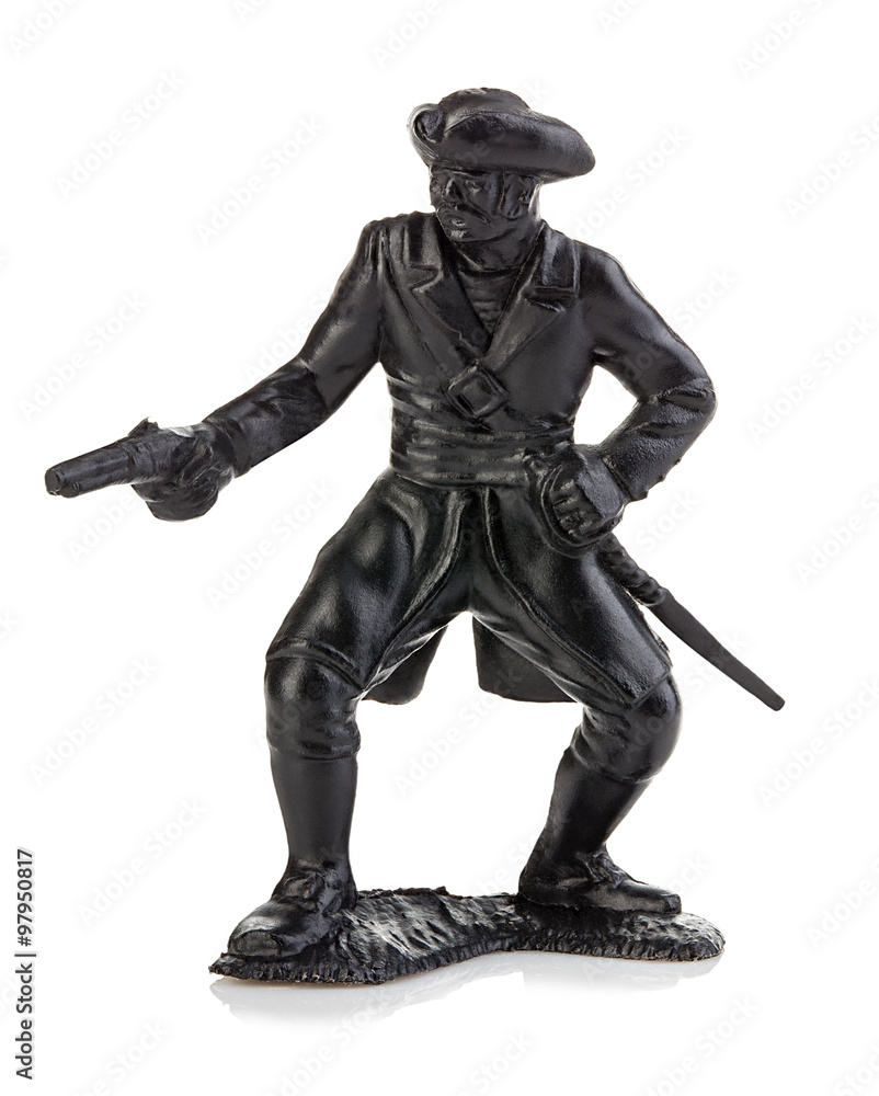 Angry pirate with gun close-up isolated on a white background. Miniature figurine of a children's toy. Angry pirate with gun close-up isolated on a white background. Miniature figurine of a children's toy.