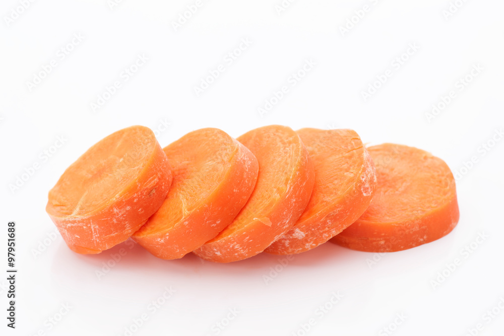 whole carrots and cutl isolated on white whole carrots and cutl isolated on white